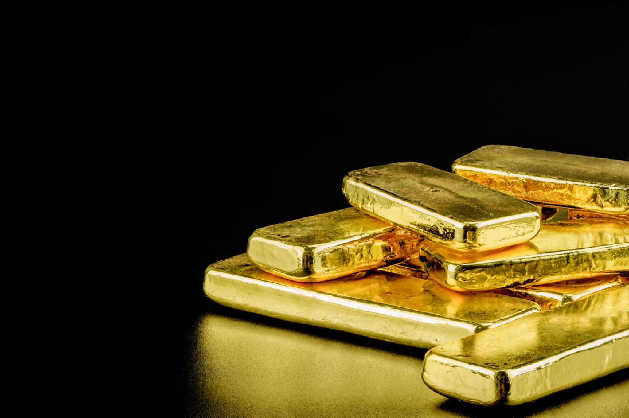 bars of gold as gold investors buy the dip