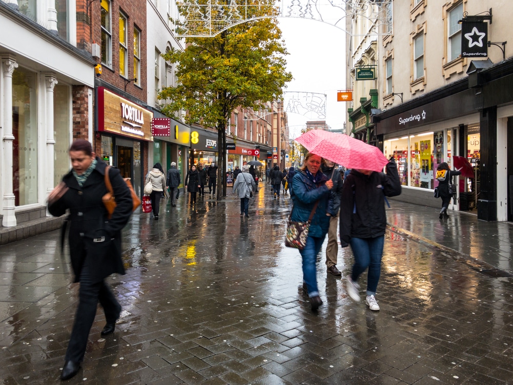 photo of a rainy high street to denote a retail sales having a dip in April