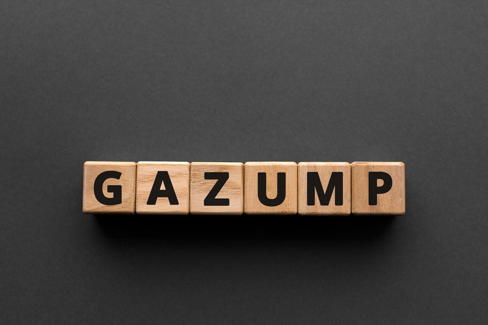 wooden blocks spelling out the word 'gazump' to denote a story about gazumping