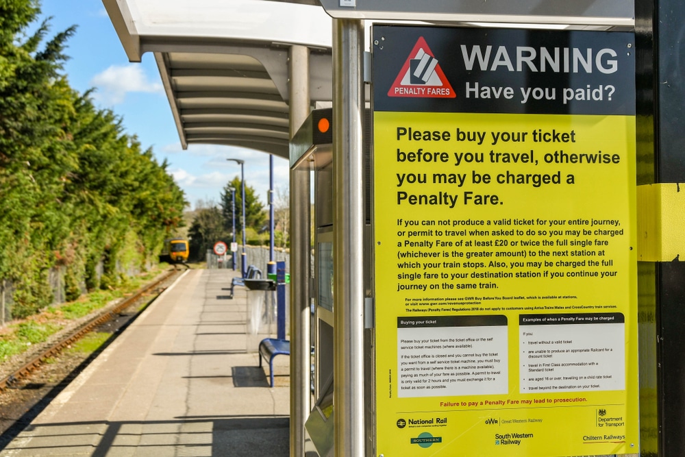 The yellow penalty fare notice warning sign to denote reforms called for train ticket penalty fares