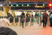 Train barriers at London Bridge Station to denote train train ticket purchasing going contactless