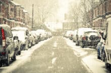 A snow covered residential street as £4m in Cold Weather Payments triggered so far this winter